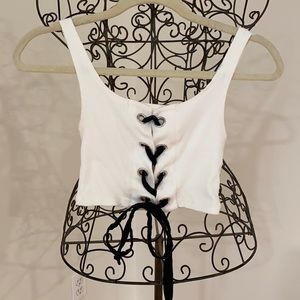 Cropped white tank with navy blue ribbon detail